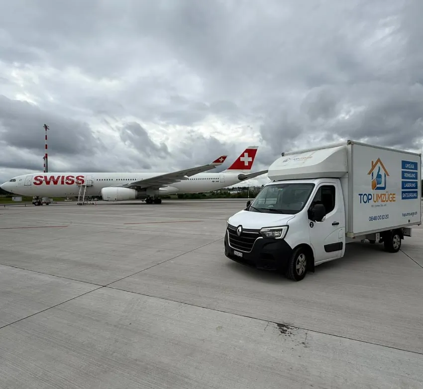 Top-Umzüge-AG-Internationaler-Umzug-Umzugsfirma-Zürich-Umzugswagen-Privatumzug-Firmenumzug-Umzugsreinigung-Flughafen-Abflug