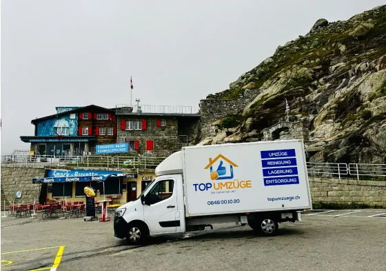 Top-Umzüge-AG-Internationaler-Umzug-Umzugsfirma-Zürich-Umzugswagen-Privatumzug-Firmenumzug-Umzugsreinigung-Lieferwagen-Gotthard-Pass-Gletscher
