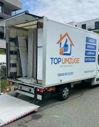 Top-Umzüge-AG-Internationaler-Umzug-Umzugsfirma-Zürich-Umzugswagen-Privatumzug-Firmenumzug-Umzugsreinigung-Auspacken-und-Einpacken-Büromaterial-Industrie